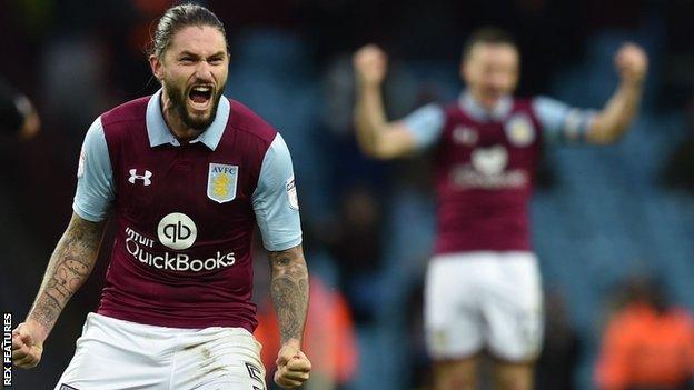 Henri Lansbury celebrates Aston Villa scoring against Derby