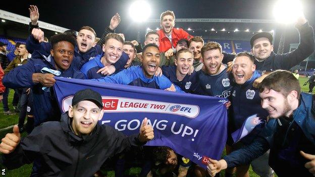 Bury players and fans celebrate promotion from League Two