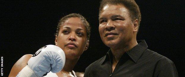 Muhammad Ali and (right) Laila Ali