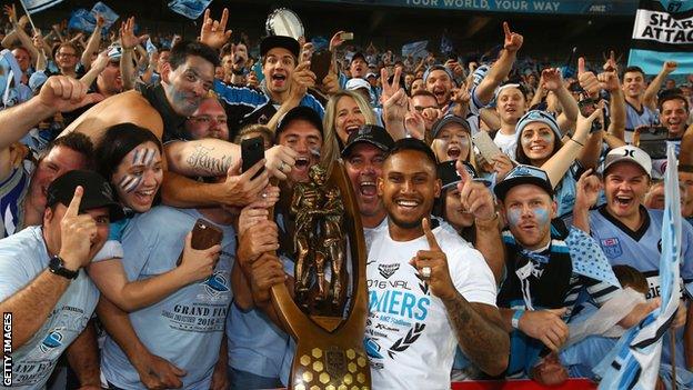 Ben Barba celebrates winning the 2016 NRL Grand Final with Sharks fans