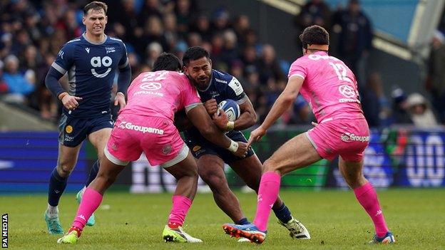 Manu Tuilagi carries the ball