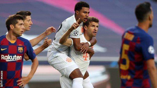 Thomas Muller (centre) celebrates scoring for Bayern Munich against Barcelona