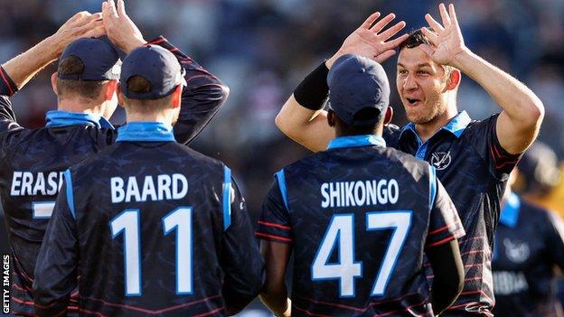 JJ Smit (right) celebrates a wicket against Sri Lanka