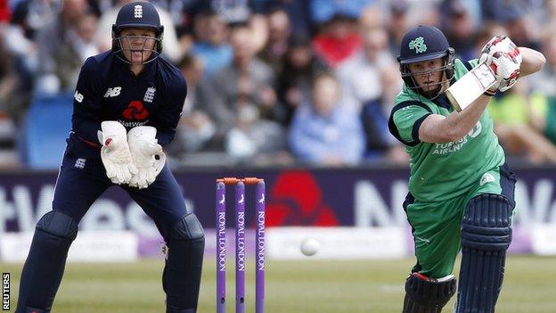 England's Sam Billings and Ireland's Kevin O'Brien