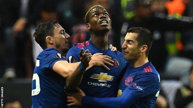 Paul Pogba (centre) celebrates with team-mates