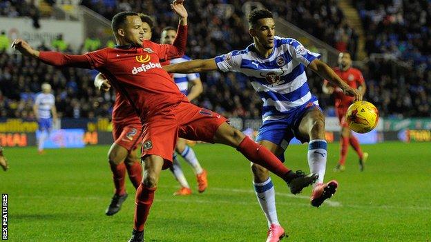 Blackburn's Marcus Olsson (left) challenges Reading's Nick Blackman