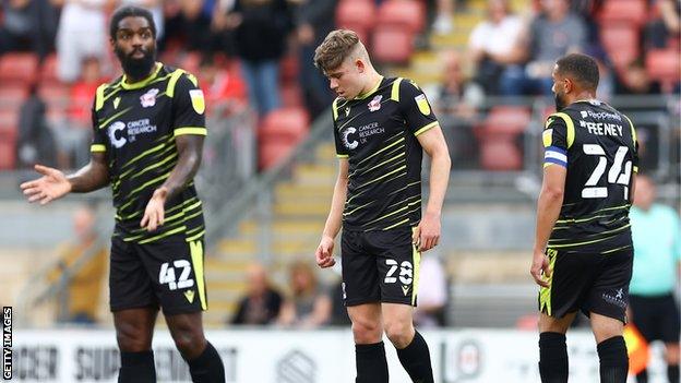 Dejected Scunthorpe United players