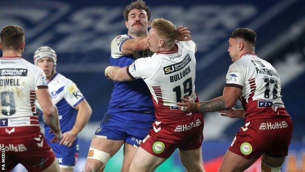 Alex Walmsley was strapped up to play a key role against Wigan in his third Grand Final triumph with St Helens