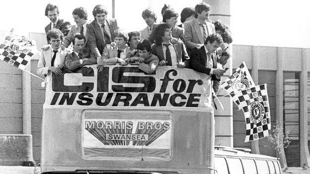 Swansea's players and staff celebrated their promotion to Division One with an open-top bus parade