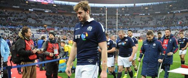 Scotland's Richie Gray and Greig Laidlaw leave the pitch in Paris