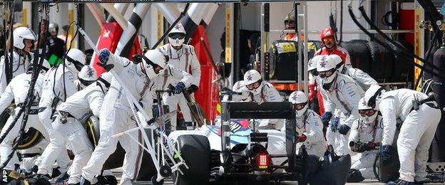 Williams' Valtteri Bottas stops with a punctured rear tyre