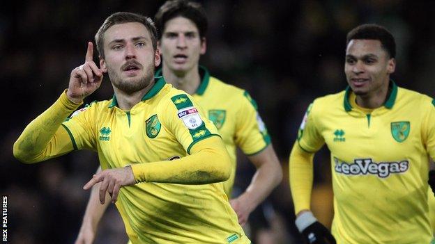 Tom Trybull (left) celebrates his goal with his teammates