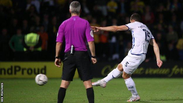 John Mousinho scores the winning penalty for Oxford