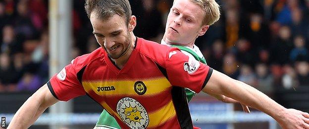 Partick's Sean Welsh shields the ball from Celtic's Gary Mackay-Steven