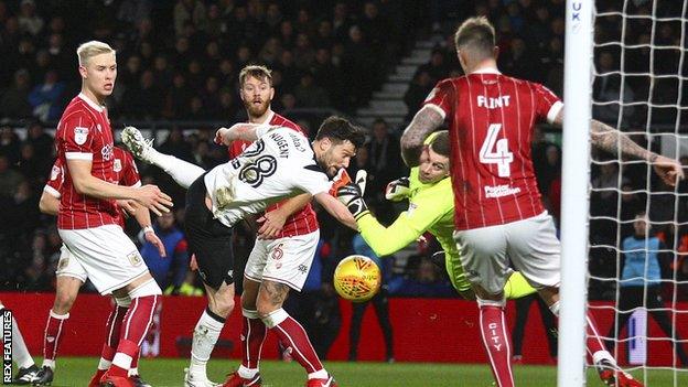 Aden Flint clears off the line for Bristol City