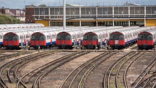 tube trains parked at the Northfields Depot