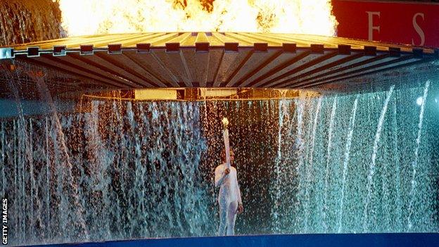 Cathy Freeman with Olympic flame