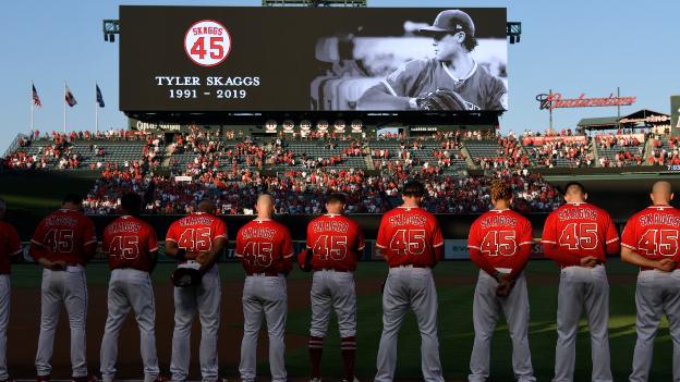 Los Angeles Angels players hold a tribute to former team-mate Tyler Skaggs