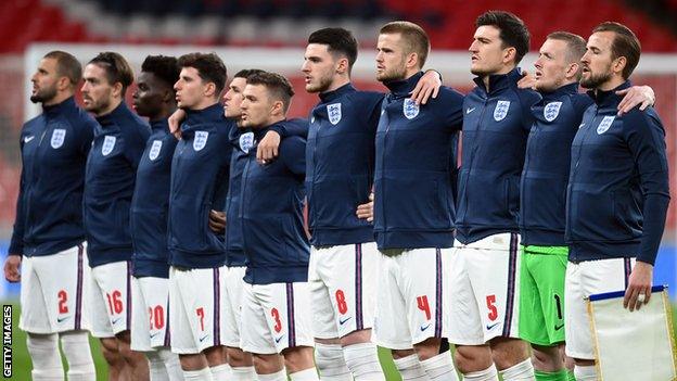 England players sing the national anthem before fixture