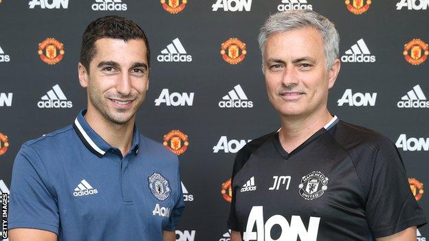 Henrikh Mkhitaryan and Jose Mourinho