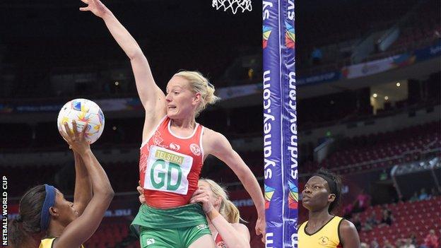 Wales goal defence Stephanie Williams defends against Uganda