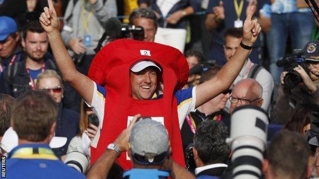 Ian Poulter in pillar box fancy dress