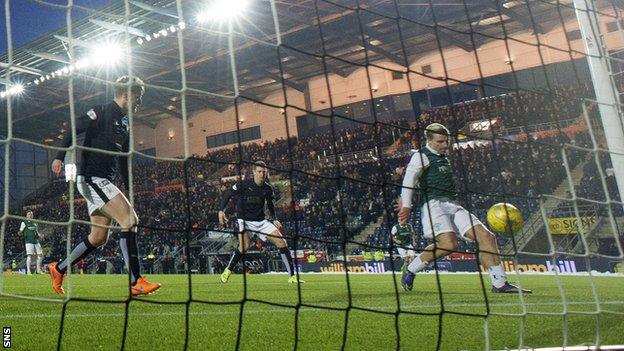 Jason Cummings scores for Hibernian against Falkirk