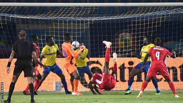 Michael Olunga celebrates