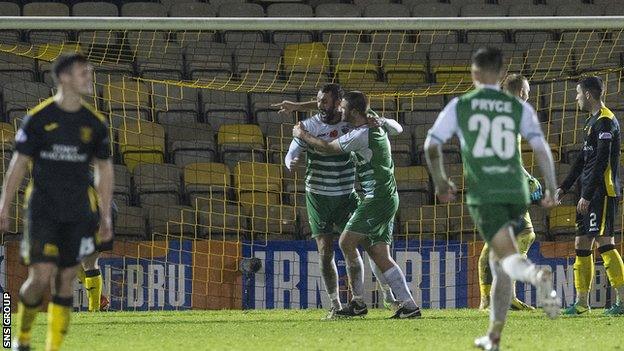 Steven Saunders celebrates knocking in the second goal for TNS