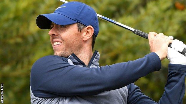 McIlroy chipped in on the 16th hole and was within two shots of the lead