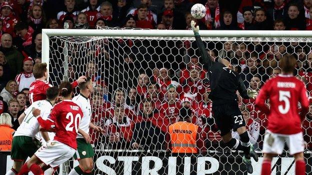 Darren Randolph saves an effort from Yussuf Poulsen