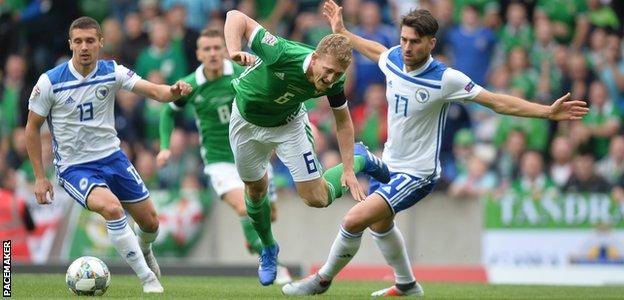 Northern Ireland felt they should have had an early penalty for Ervin Zukanovic's challenge on George Saville