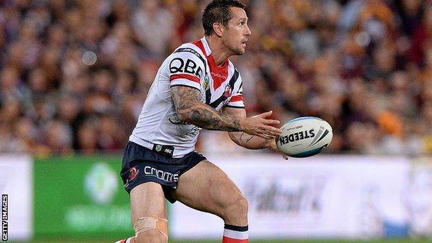 Mitchell Pearce passes the ball