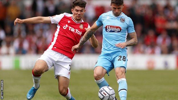 Wrexham's Jordan Davies in action against Grimsby Town