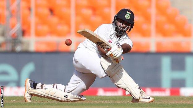 India batsman Rishabh Pant plays a sweep shot on day two of the final Test against England