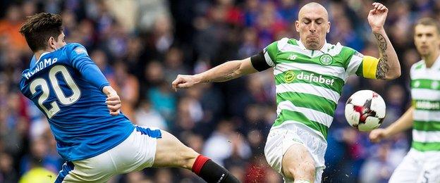 Celtic captain Scott Brown and Rangers midfielder Emerson Hyndman