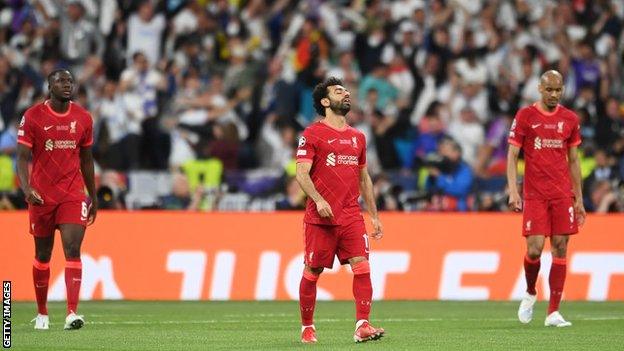 Liverpool players look disappointed after Saturday's Champions League final loss