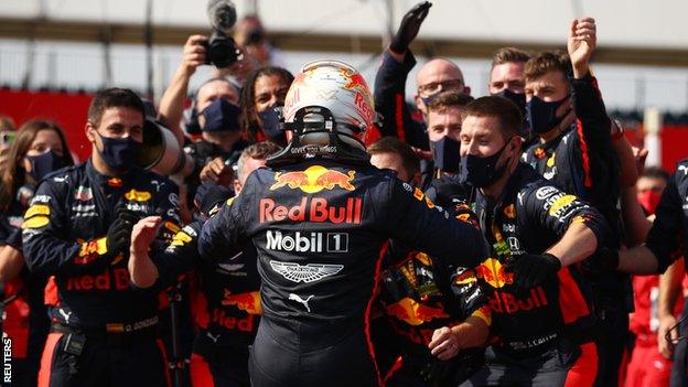 Max Verstappen celebrates with his Red Bull team