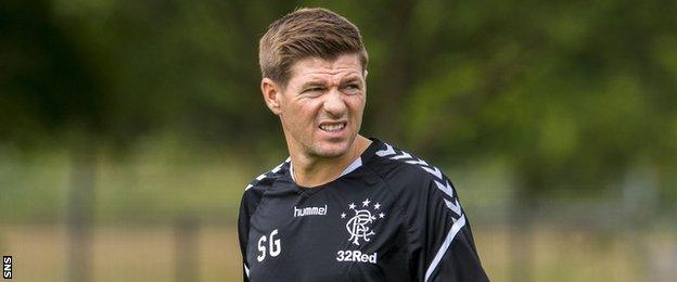 Steven Gerrard surveys Rangers training