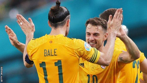 Wales' Gareth Bale and Aaron Ramsey celebrate