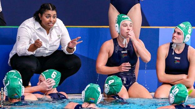 Delaine Mentoor poolside with the South Africa women water polo team