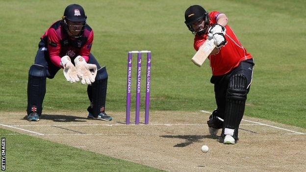 Paul Horton drives the ball towards mid-off for four runs for Leicestershire against Northamptonshire
