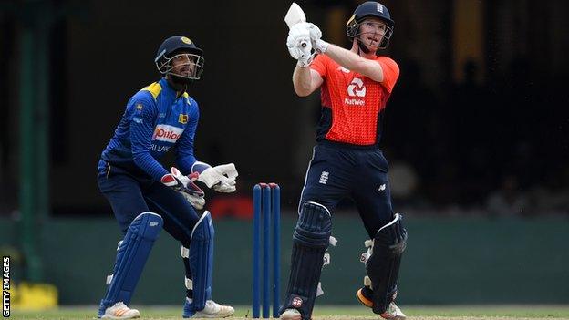 England captain Eoin Morgan hits a six against a Sri Lanka Cricket XI in Colombo