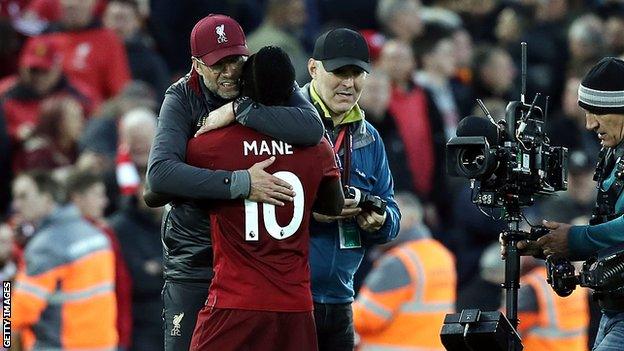 Jurgen Klopp hugs Sadio Mane