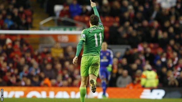 Adam Johnson celebrates scoring a goal