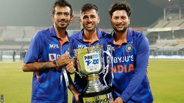 India players celebrate with the trophy after beating West Indies in the final T20