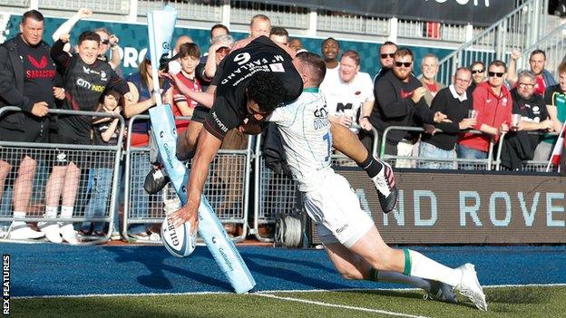 Theo McFarland dives over to score his second try against Northampton