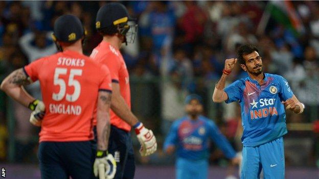 Ben Stokes and Liam Plunkett look on as Yuzvendra Chahal celebrates a wicket