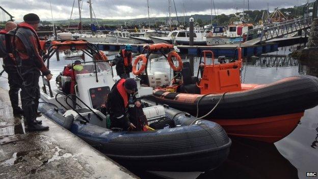 The scientists load up the boats before heading out to sea