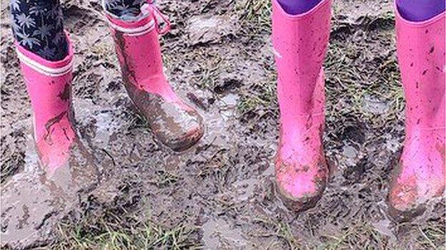 Wellies in a muddy field